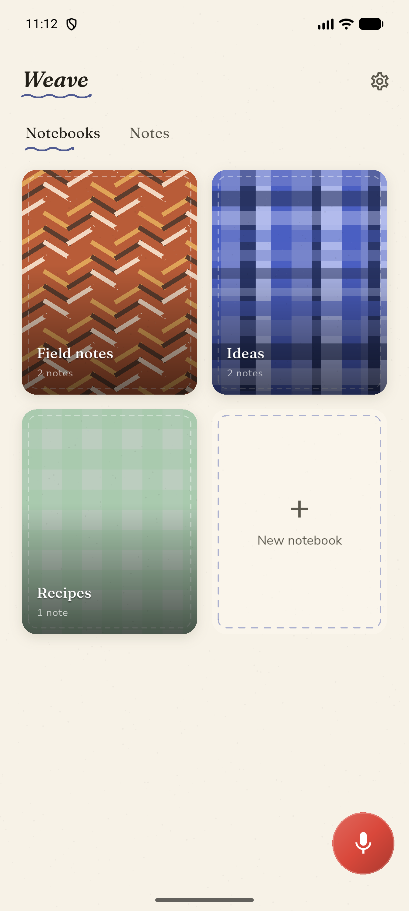 Home screen with woven notebook covers on warm paper.